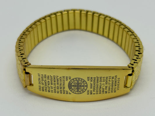 Pulsera dorada tipo reloj con Oración de San Benito